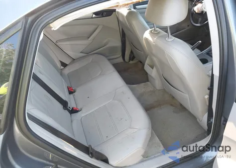 2015 Volkswagen Passat 1.8T Wolfsburg Edition z USA, uszkodzony, nr VIN 1VWAS7A35FC007059